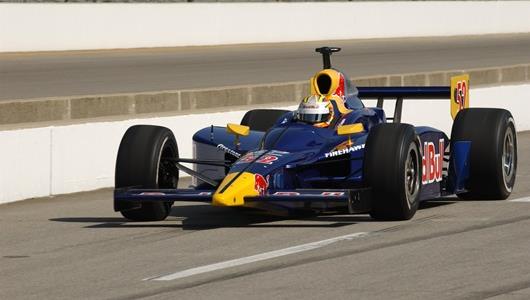 Ed Carpenter in the #52 Red Bull Cheever Racing Dallara Chevrolet coming down pit lane at Indianapolis Motor Speedway during the Rookie Orientation Program.
