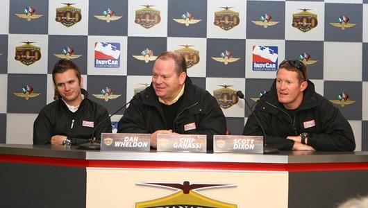 Team owner Chip Ganassi is flanked by his drivers, Dan Wheldon, left, and Scott Dixon at the Indianapolis Motor Speedway.