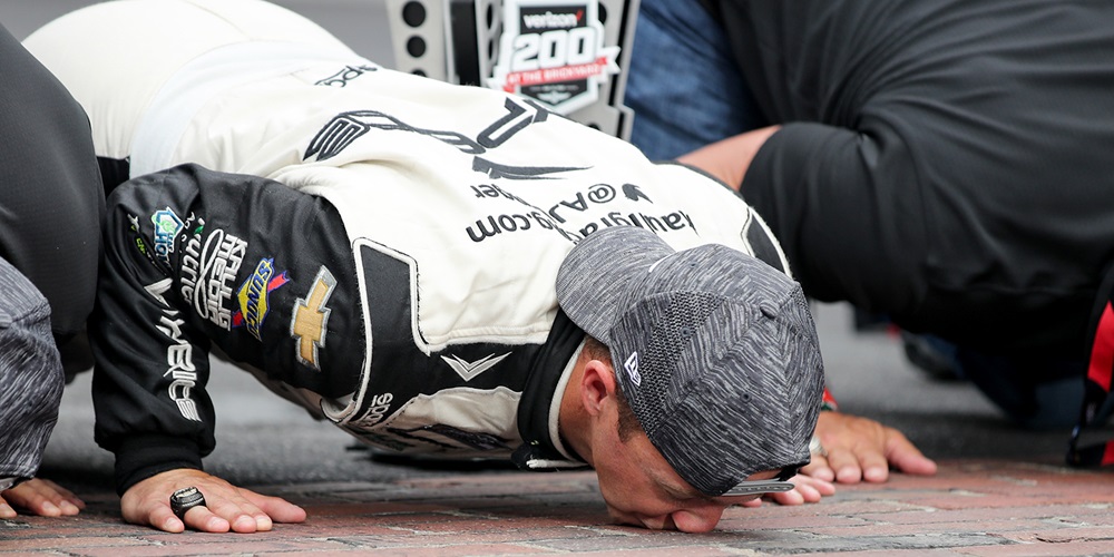 AJ Allmendinger Kisses the Bricks at Indianapolis Motor Speedway