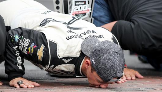 AJ Allmendinger Kisses the Bricks at Indianapolis Motor Speedway