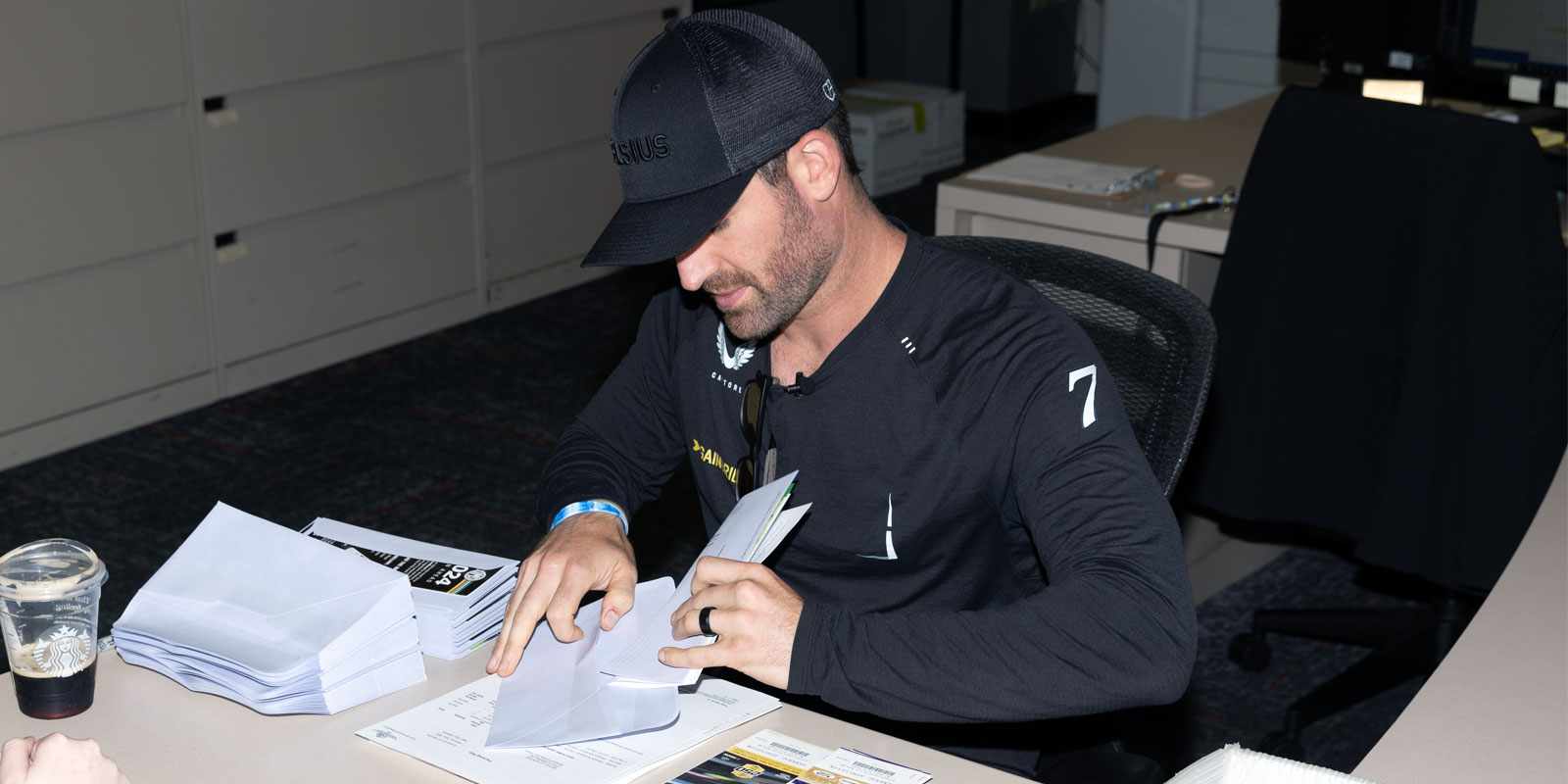 Corey LaJoie packages tickets in the Indianapolis Motor Speedway ticket office