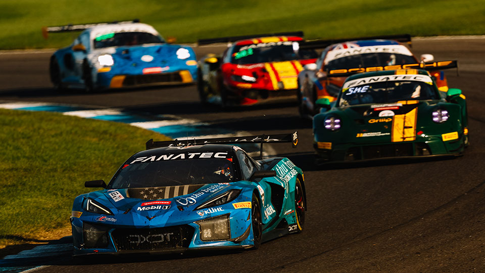 Cars race at the Indianapolis 8 Hour