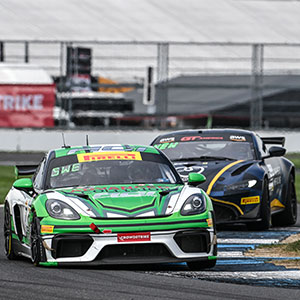 A car races at the Indianapolis 8 Hour