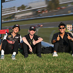 Fans watch the Indianapolis 8 Hour