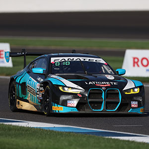 A car races at the Indianapolis 8 Hour