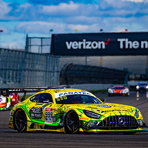A car races at the Indianapolis 8 Hour