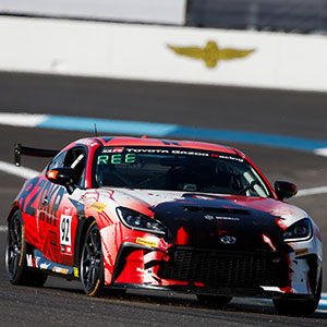 A car races at the Indianapolis 8 Hour