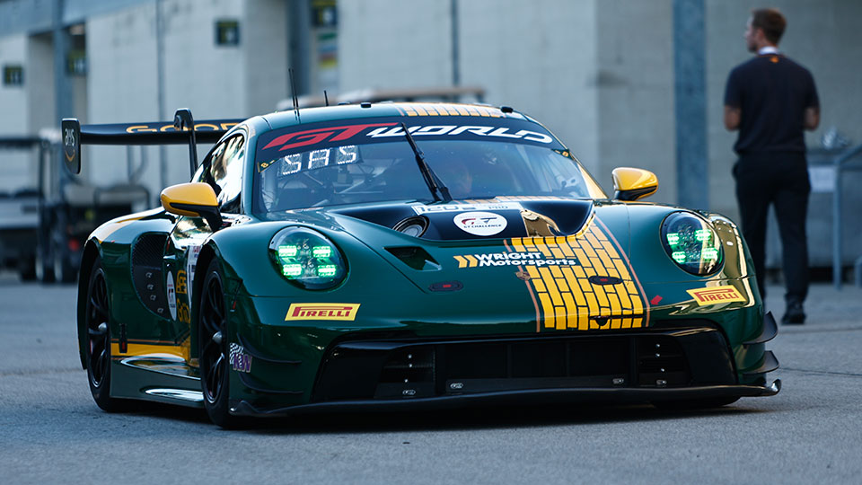 A car races at the Indianapolis 8 Hour