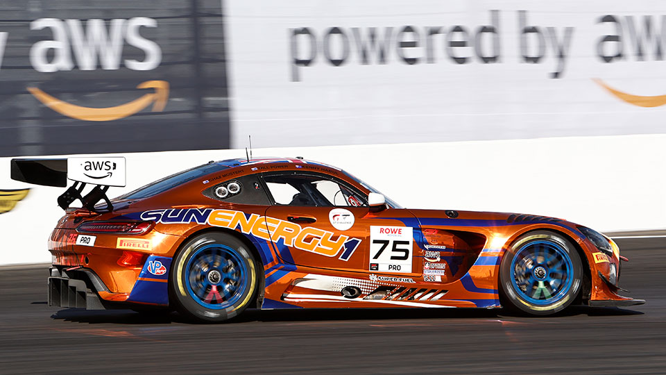 A car races at the Indianapolis 8 Hour