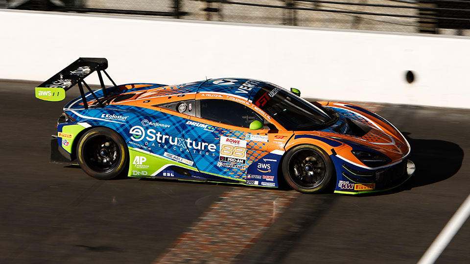 A car races at the Indianapolis 8 Hour