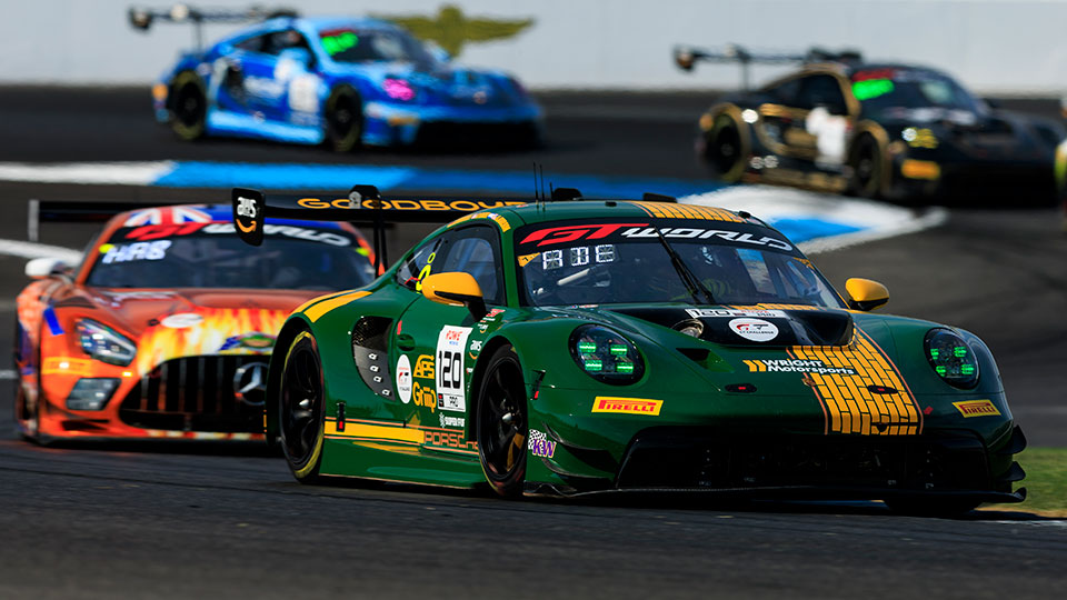 Cars race at the Indianapolis 8 Hour