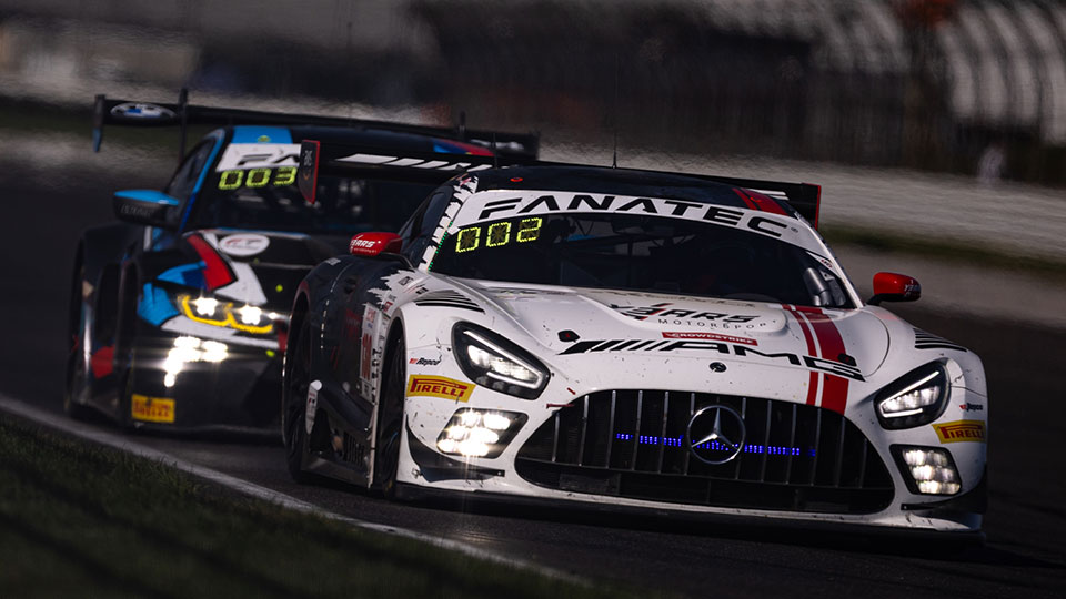 A car races at the Indianapolis 8 Hour