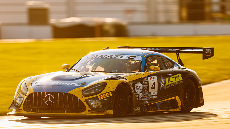 A car races at the Indianapolis 8 Hour