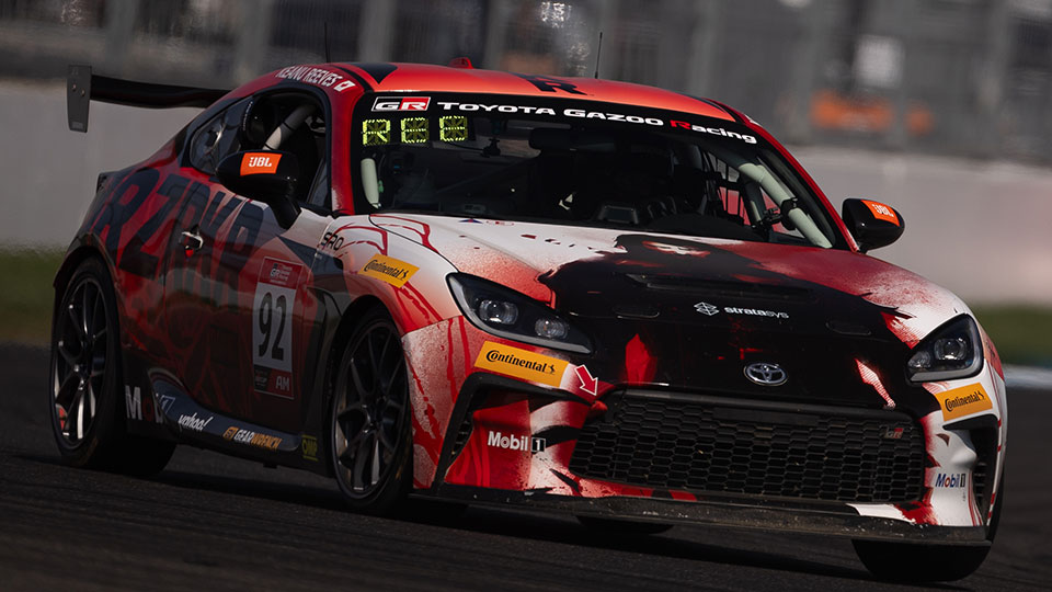 A car races at the Indianapolis 8 Hour