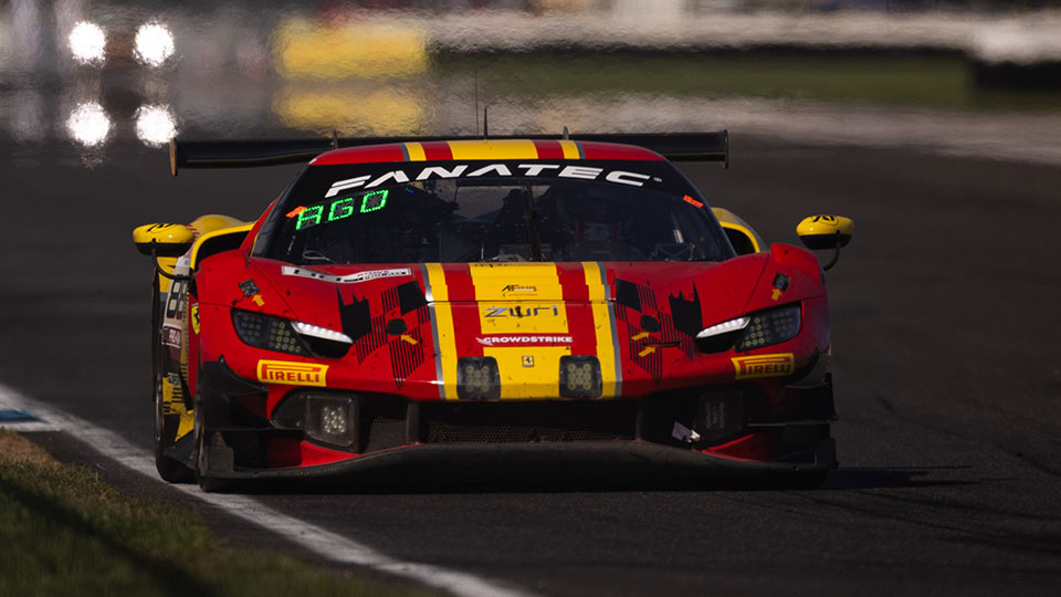 A car races at the Indianapolis 8 Hour