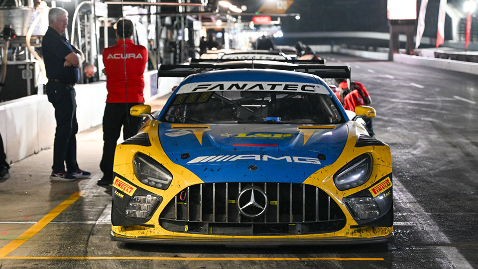 A car is in pit lane at the Indianapolis 8 Hour