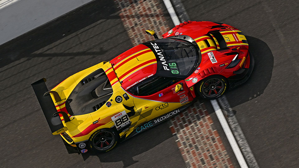 A car races at the Indianapolis 8 Hour