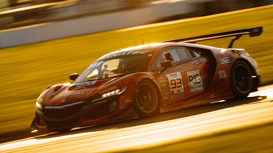 A car races at the Indianapolis 8 Hour