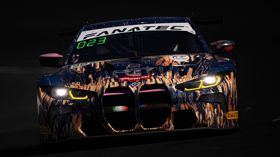 A car races at the Indianapolis 8 Hour