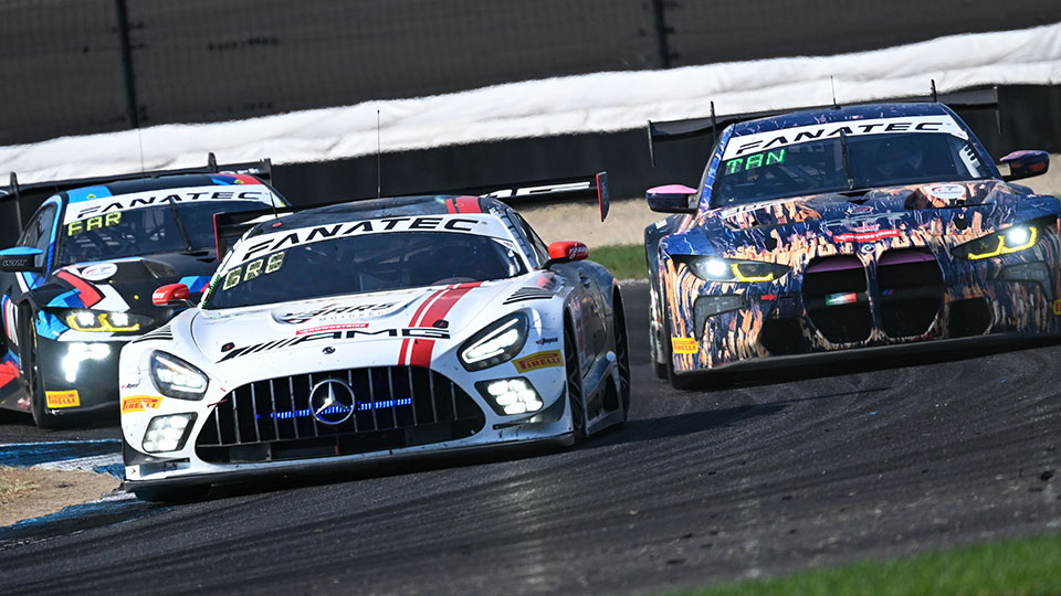 A car races at the Indianapolis 8 Hour