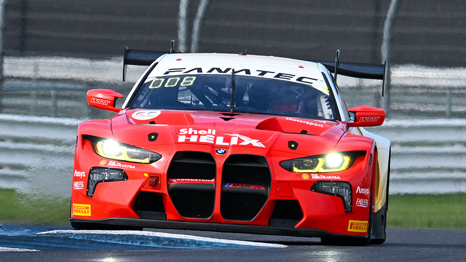 A car races at the Indianapolis 8 Hour