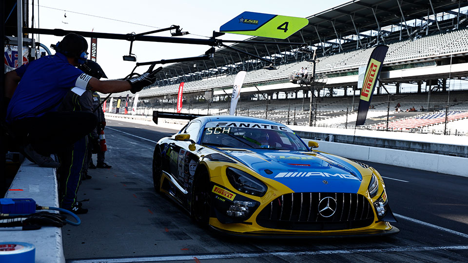 A car makes a pit stop at the Indianapolis 8 Hour