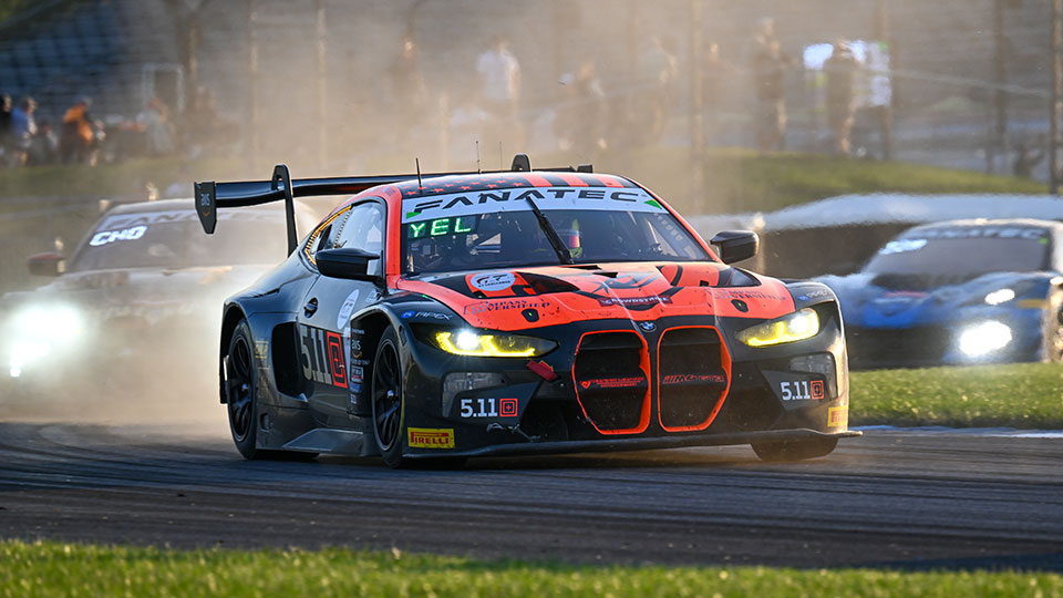 A car races at the Indianapolis 8 Hour
