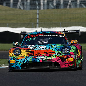 A car races in the Indianapolis 8 Hour