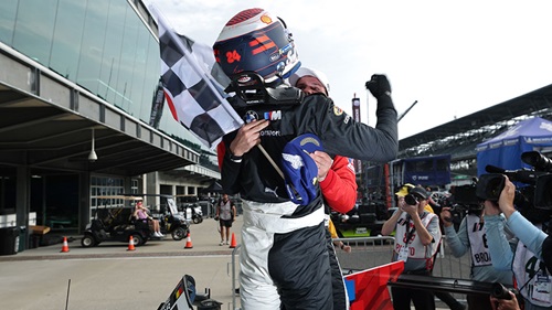 The winners hug