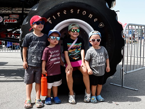 Fans pose in the Rule the Road Midway