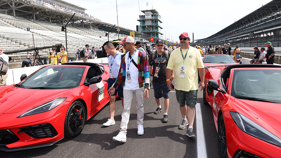 Men walk down the cold pit pre-race