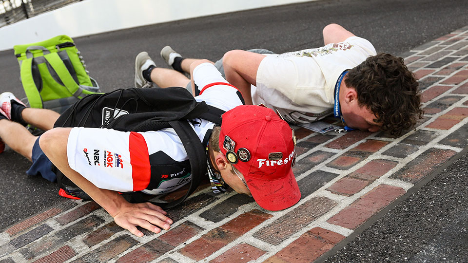 Boys kiss the bricks