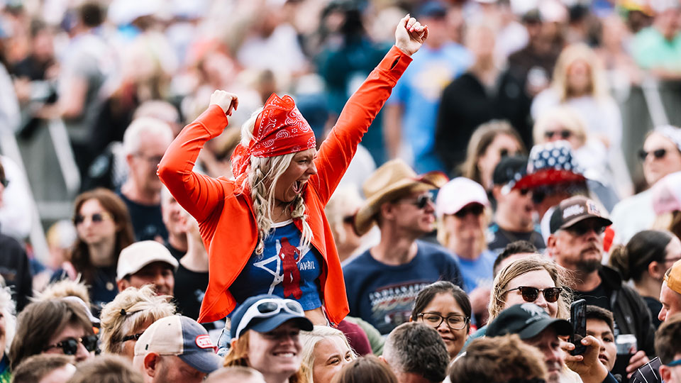A fan enjoys the Miller Lite Carb Day concert