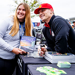 Newgarden poses with a fan