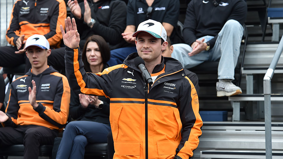 Pato O'Ward waves to fans