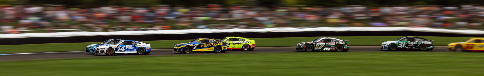 NASCAR Cup Cars navigate the road course at Indianapolis Motor Speedway