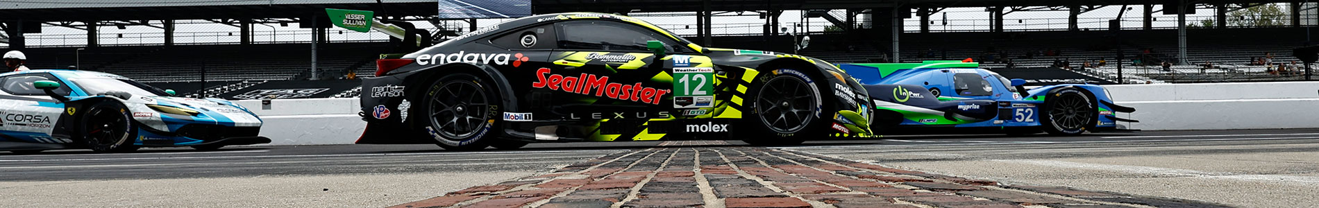 IMSA Cars cross the Yard of Bricks