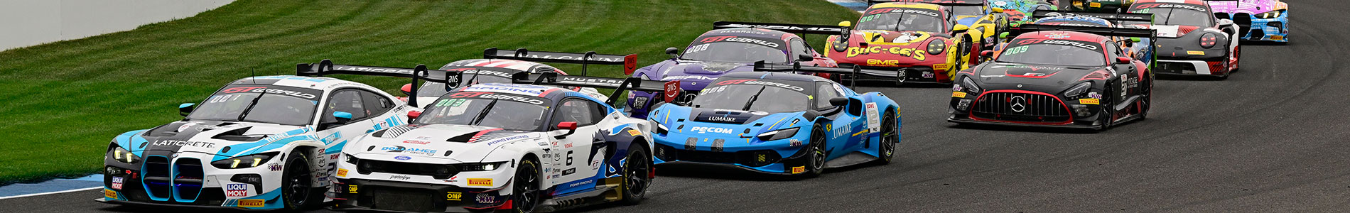 Cars race in the Indianapolis 8 Hour