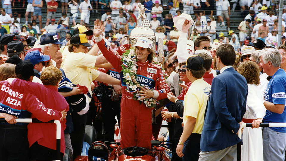 Arie Luyendyk celebrates winning the Indy 500