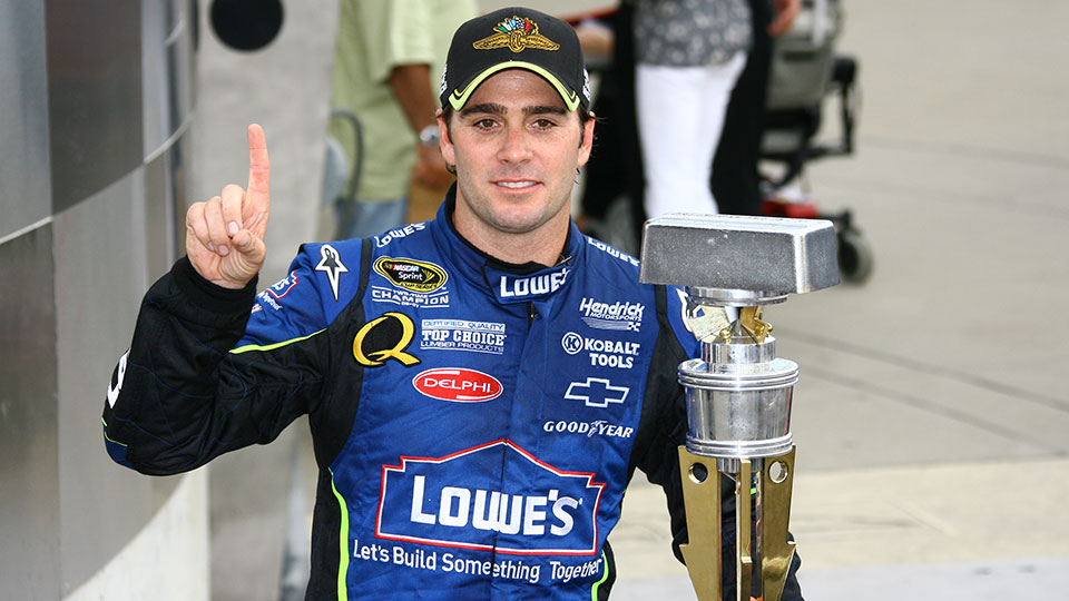 Jimmie Johnson celebrates winning the Brickyard 400