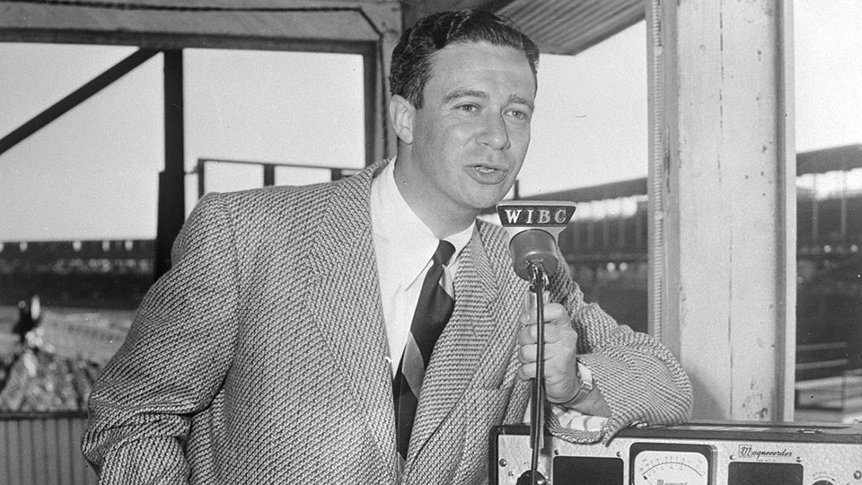 Sid Collins records a radio broadcast