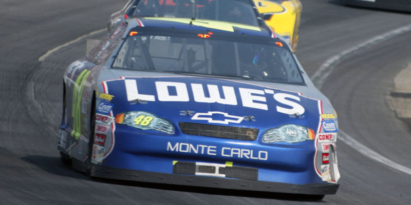 Jimmie Johnson on track in the #48 car during his rookie year in the 2002 Brickyard 400