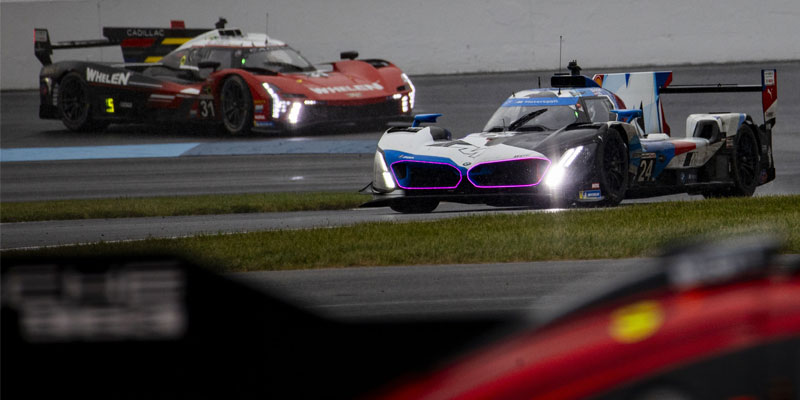 #24 BMW M Hybrid V8 navigates a rainy Indianapolis Motor Speedway on Sunday